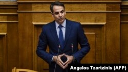 New Democracy party leader Kyriakos Mitsotakis speaks during a parliamentary session in Athens on June 14.