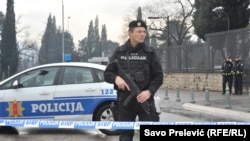 Police block off the area around the U.S. Embassy building in Podgorica after a grenade attack on the facility on February 22. 