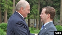 Russian President Dmitry Medvedev (right) greets his Belarusian counterpart Alyksandr Lukashenka in Gorki, outside Moscow, in June.