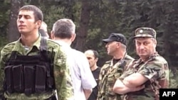 South Ossetian leader Eduard Kokoity (right) outside Tskhinvali on August 7