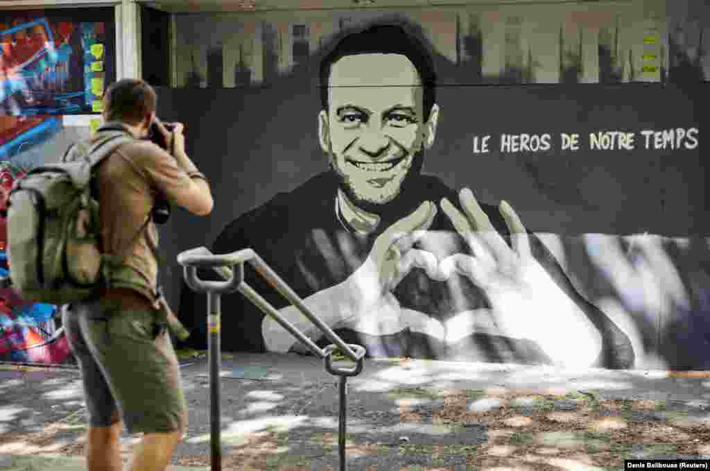 A mural of Russian opposition activist Aleksei Navalny in Geneva on June 14. The text reads &quot;Hero of our time.&quot;