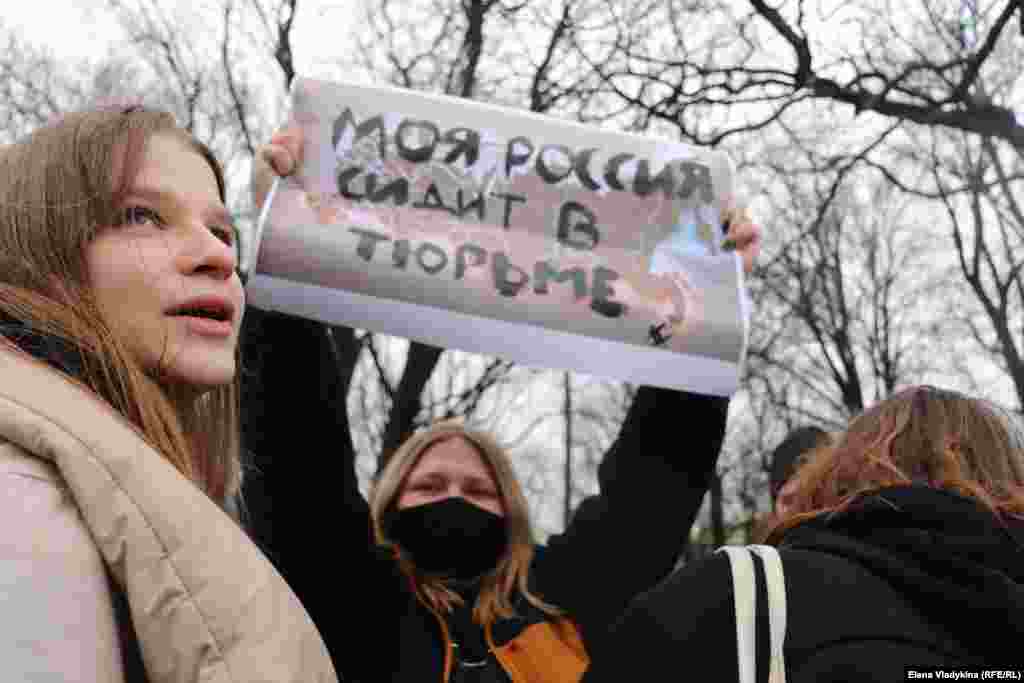 A demonstrator in St. Petersburg holds a sign reading: &quot;My Russia Is In Prison.&quot;