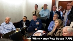 President Barack Obama (second from left) and then-Vice President Joe Biden (left) are shown in the Situation Room at the White House along with other senior officials to watch live video feed of the raid that killed Osama bin Laden in 2011. 