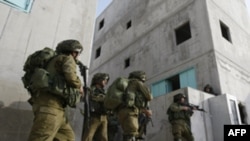 Israeli Army reservists practice at the Urban Warfare Training Center in southern Israel on January 11.