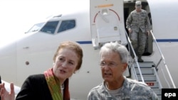 General John Craddock (right) and USAID Director Henrietta Fose arriving in Tbilisi