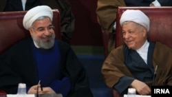 Iranian President Hassan Rohani (left) and former President Ali Akbar Hashemi Rafsanjani have called the insinuation an insult to voters' intelligence.