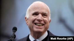 Senator John McCain smiles upon receiving the Liberty Medal from the National Constitution Center in Philadelphia in October 2017. 