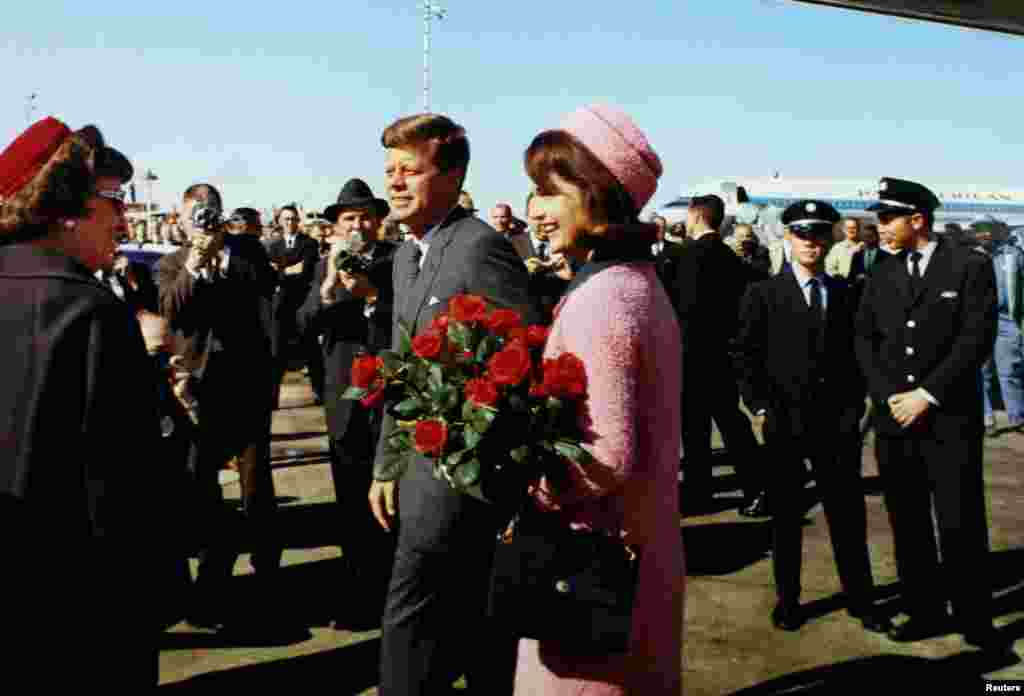 President John F. Kennedy and first lady Jacqueline Kennedy arrive at Love Field in Dallas, Texas less than an hour before his assassination on November 22, 1963.