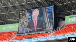 A speech by FC Shakhtar president Rinat Ahkhmetov is broadcast on a giant screen during a peace rally held at the Donbass Arena in the eastern Ukrainian city of Donetsk on May 20.