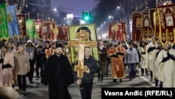 People gather at the invitation of the Serbian Orthodox Church to walk through the center of Belgrade on January 8.