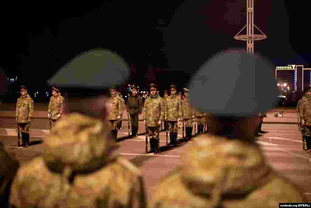 Belarusian military officers inspecting their soldiers.