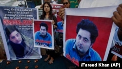 Members of a Pakistani civil-society group demonstrate against the killing of university student Mohammad Mashal Khan last year. 