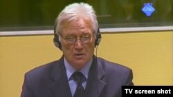 Momcilo Perisic, the former chief of staff of the Yugoslav People's Army, appears in court in The Hague in October.