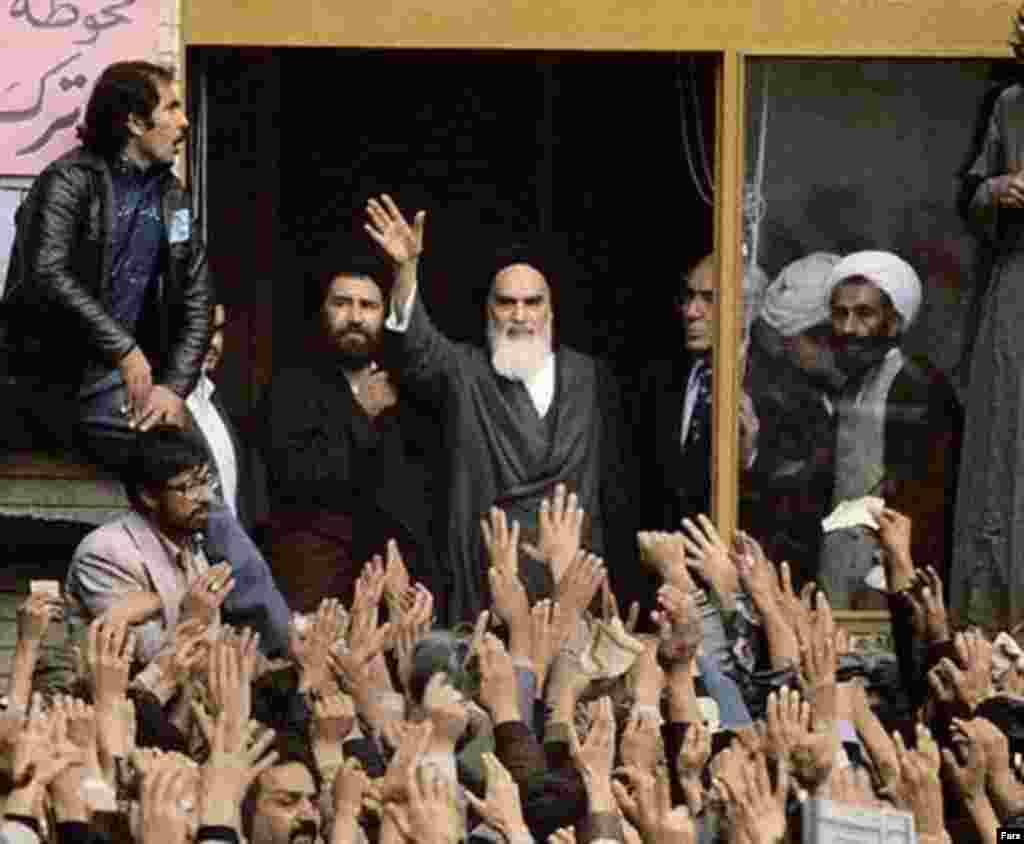 Khomeini greets supporters on February 1, 1979, the day of his return from exile in France.