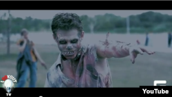 A screen shot from a video taken at the Zombie flash mob in Omsk on August 19.