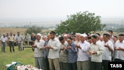 Observers complain Russia's been obstructing the European court's work on Chechnya, where mourners are seen here next to the body of slain rights activist Natalya Estemirova in July 2009, for years.