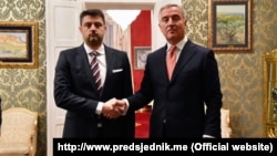 Serbian Ambassador to Montenegro Vladimir Bozovic (left) with Montenegrin President Milo Djukanovic in January this year. 