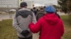 Belarus Protest Leaders Detained As Hundreds Rally Against 'Parasite Tax'