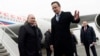 Russian President Vladimir Putin (left) is welcomed by Hungarian Foreign Minister Peter Szijjarto at the Liszt Ferenc International Airport in Budapest on February 2.