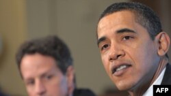 U.S. President Barack Obama (right) with Treasury Secretary Tim Geithner at the daily economic meeting at the White House on March 23.