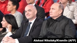 Russian President Vladimir Putin (right) and FIFA President Gianni Infantino at a gala concert on Moscow's Red Square dedicated to the 2018 World Cup football tournament on June 13.