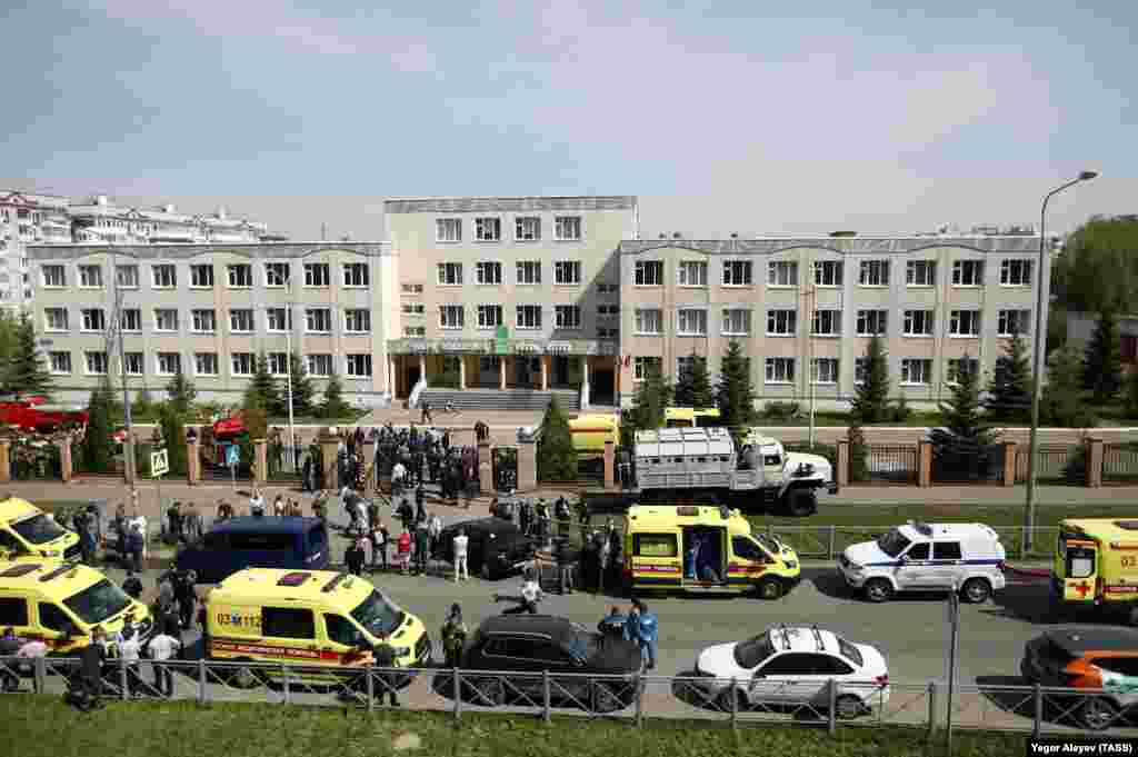 Police cars and ambulances outside School No. 175