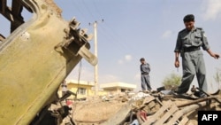 The site of a bomb blast at a city police post west of Kabul last month