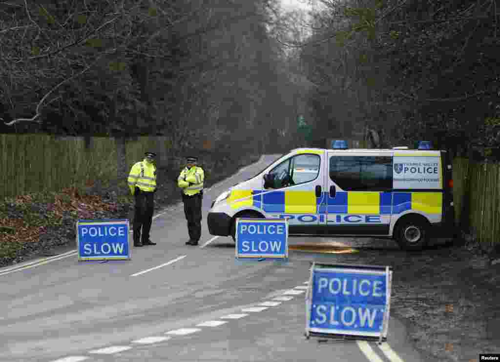 A police cordon blocks the road leading to Boris Berezovsky&#39;s house after he was found dead at his home near Ascot in Berkshire in as yet unexplained circumstances on March 23, 2013. &nbsp;