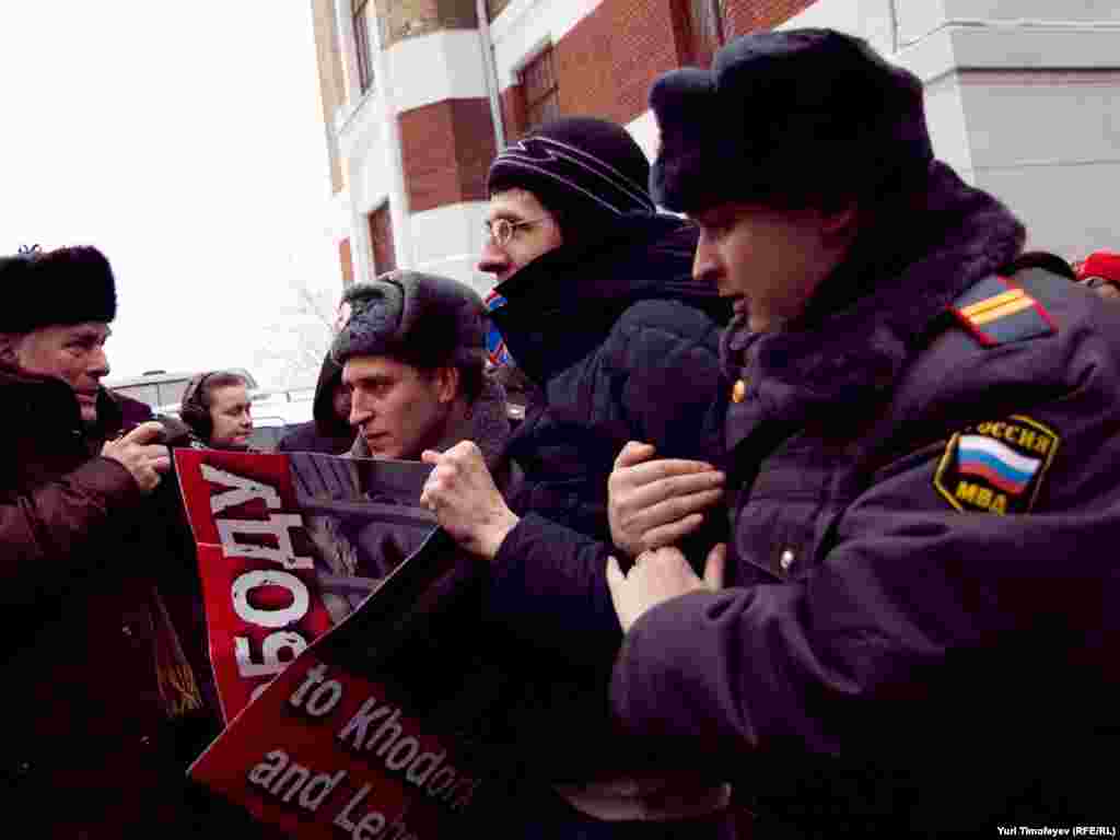 Police arrested at least 20 people at the rally.