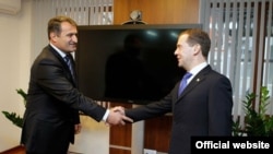 Russian President Dmitry Medvedev (right) meets with South Ossetian presidential candidate Anatoly Bibilov in Vladikavkaz.