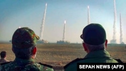 A photo provided by Iran's Revolutionary Guards shows the launch of missiles during a military drill in an unknown location in central Iran on January 15.