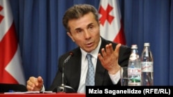 Georgian Prime Minister Bidzina Ivanishvili made a demand for President Mikheil Saakashvili's resignation one of his first major moves after winning elections in October, before backing away from that hard line.