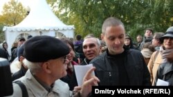 The foreign funding is at the heart of allegations leveled against Russian opposition leader Sergei Udaltsov (right).