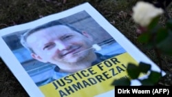 A flyer from a protest in February outside the Iranian Embassy in Brussels for Ahmadreza Djalali, an Iranian academic detained in Tehran and sentenced to death for espionage. (file photo)