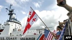 Georgians welcome the U.S. Coast Guard cutter "Dallas" in the Black Sea port of Batumi on August 27, 2008.