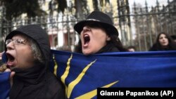 Opponents of the name change chant slogans in a rally in the northern port city of Thessaloniki on January 25.