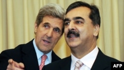 U.S. Senator John Kerry (left) with Pakistani Prime Minister Yousaf Raza Gilani in Islamabad in December 2008