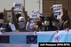 Afghan contractors protest in Herat on June 9.