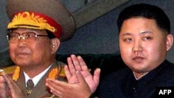 North Korean leader Kim Jong Il's son Kim Jong Un (right) emerged in 2009 as his father's likely successor.