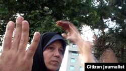 Faezeh Hashemi attends a pro-Musavi rally after the June 2009 presidential election in Tehran.