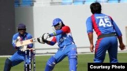 A U.S. batsman takes a swing in a qualifier against Afghanistan, won by the Afghans, in Dubai on February 11 for the Twenty20 World Cup. (photo International Cricket Council)